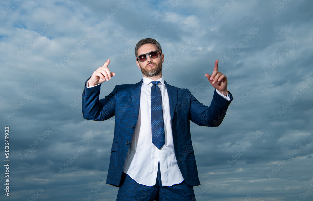 carefree business man point finger in suit. photo of carefree business man in suit. carefree business man point finger in suit. photo of carefree business man in suit.