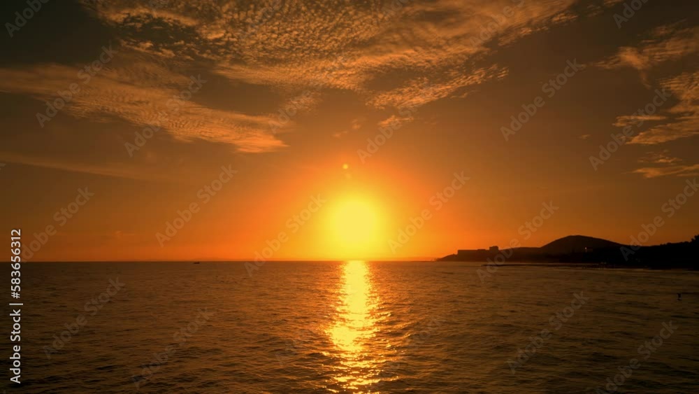 Bright red beautiful sunset on the sea in Vietnam. Surf sea waves background at sunset. 4K Bright red beautiful sunset on the sea in Vietnam. Surf sea waves background at sunset. 4K