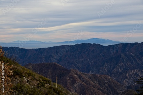 The winding Angeles Crest Highway provides views over the Los Angeles Basin and surrounding urban valleys, the snow-dusted San Gabriel and San Bernandino Mountains and the Mojave Desert © Andrew