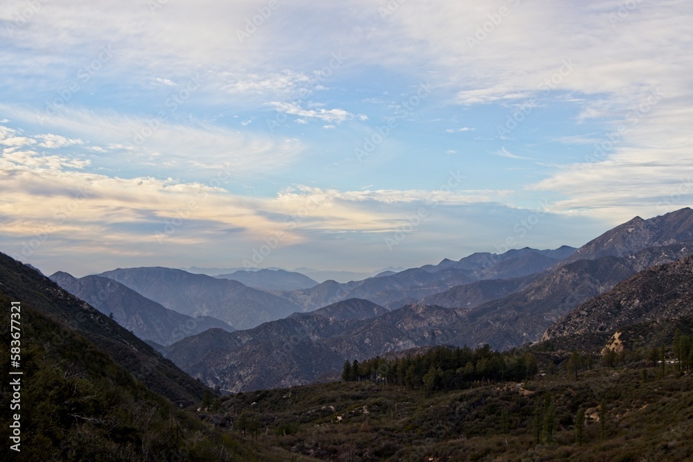 The winding Angeles Crest Highway provides views over the Los Angeles Basin and surrounding urban valleys, the snow-dusted San Gabriel and San Bernandino Mountains and the Mojave Desert The winding Angeles Crest Highway provides views over the Los Angeles Basin and surrounding urban valleys, the snow-dusted San Gabriel and San Bernandino Mountains and the Mojave Desert