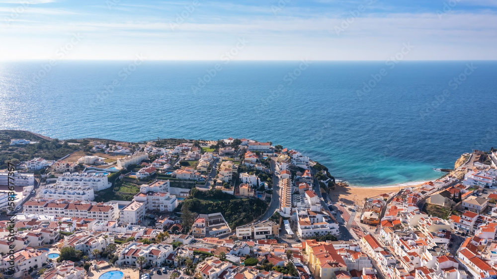 Aerial view of portuguese tourist village Carvoeiro Portugal Algarve in summer on a sunny day.