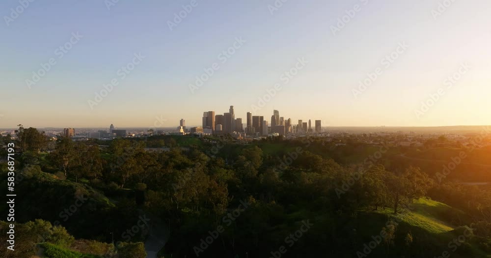 Aerial of downtown Los Angeles in dawn, sunset in California, skyscrapers and office buildings, golden light. Cinematic urban aerial time lapse of downtown Los Angeles city skyline with skyscrapers. Aerial of downtown Los Angeles in dawn, sunset in California, skyscrapers and office buildings, golden light. Cinematic urban aerial time lapse of downtown Los Angeles city skyline with skyscrapers.