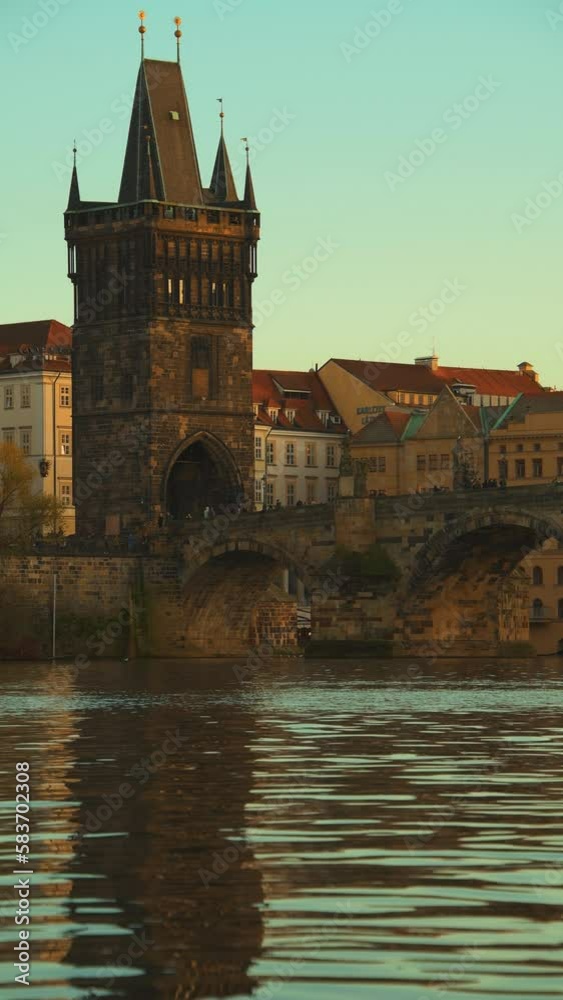 landscape with Vltava river and Karlov most in the evening in autumn in Prague, Czech Republic.