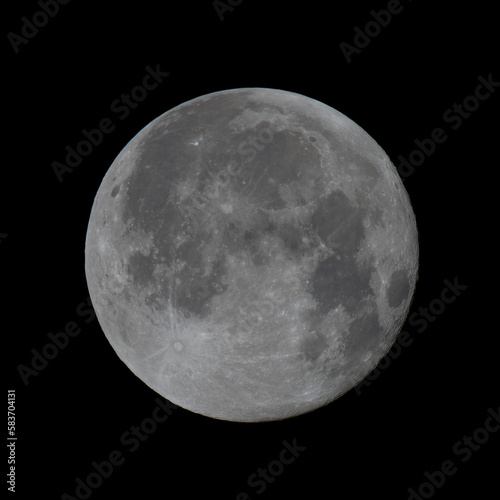 The full moon on a clear black night sky