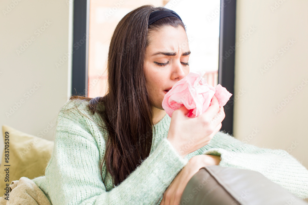 pretty young woman flu and illness concept. house interior design pretty young woman flu and illness concept. house interior design