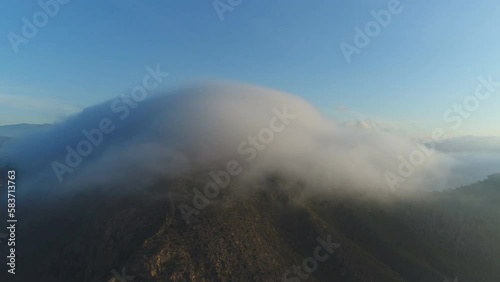 Aerial view of clouds enveloping mountains, Taif Saudi Arabia photo