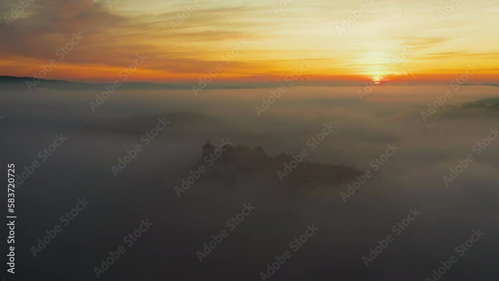 Aerial drone view of Benedictine Abbey over Vistula river in Tyniec in the morning fog, Krakow, Poland Aerial drone view of Benedictine Abbey over Vistula river in Tyniec in the morning fog, Krakow, Poland
