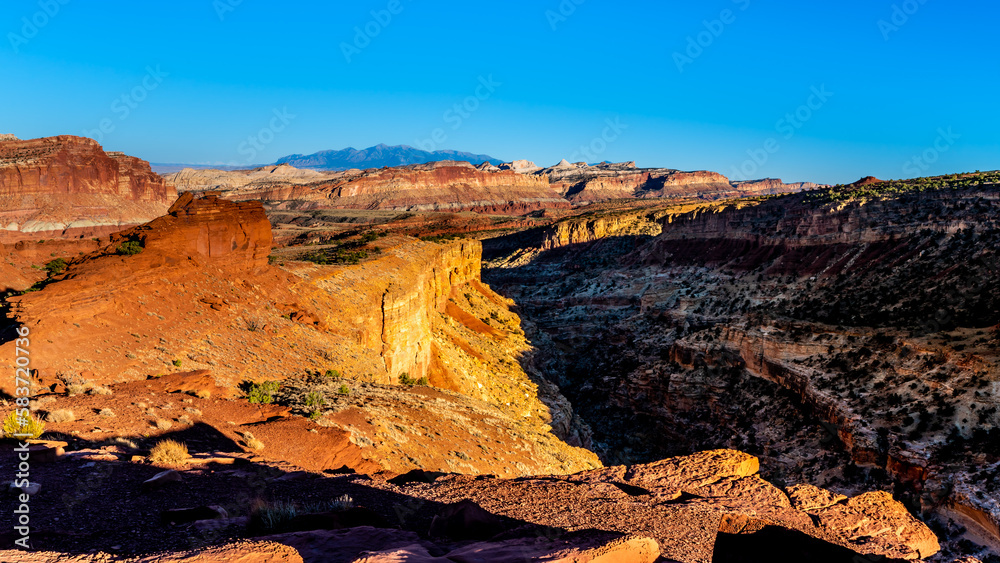 View of the Red Sandstone rock formations surrounding Sulphur Creek Canyon at Sunset Point in Capitol Reef National Park, Utah, USA