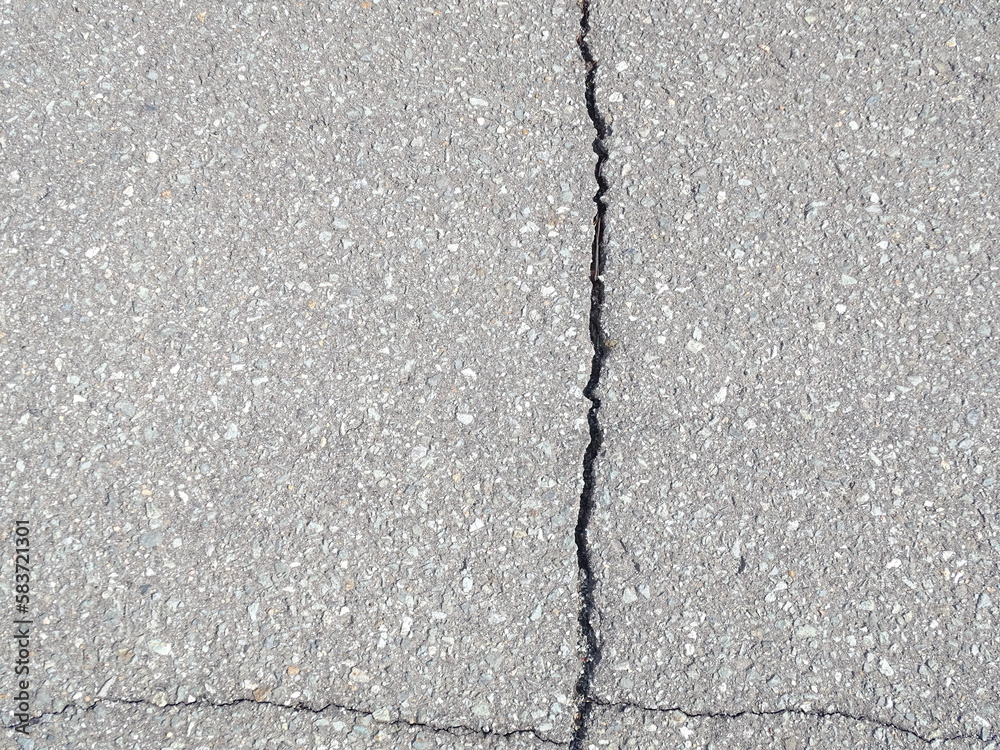 Obraz premium 道路のひび割れ