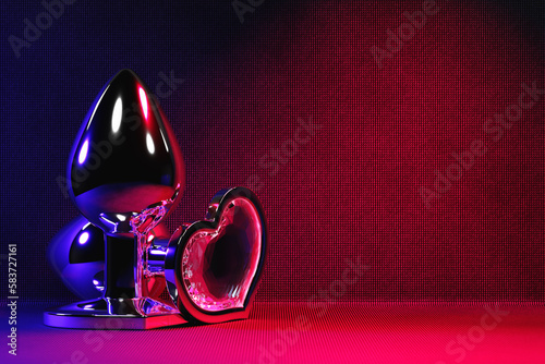 Black  butt anal plugs sex toys on  neon lights. 3D illustration. Empty space for your text