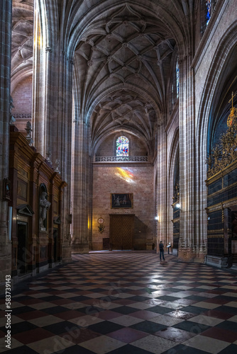 Female tourist inside the Cathedral of Segovia Spain