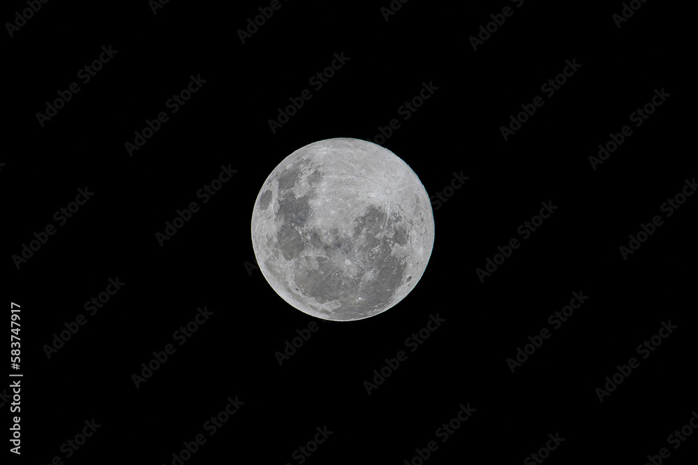 full moon over black