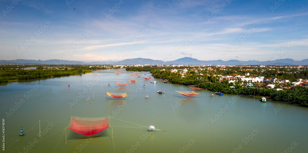Stationary Lift Net Fishing Trap at Cua Dai Beach, Hoi An, Vietnam. Hoian is recognized as a World Heritage Site by UNESCO.