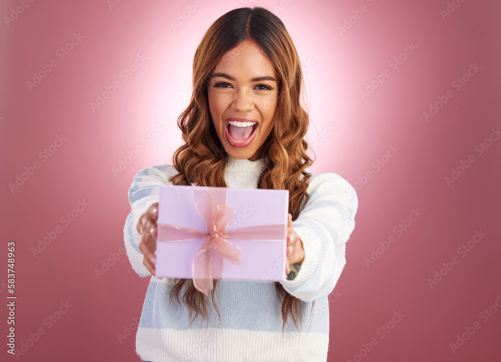Woman, present and box in studio portrait with giving surprise, happy or celebration by gradient background. Student girl, young or happiness with gift package, excited face or celebrate for giveaway Woman, present and box in studio portrait with giving surprise, happy or celebration by gradient background. Student girl, young or happiness with gift package, excited face or celebrate for giveaway