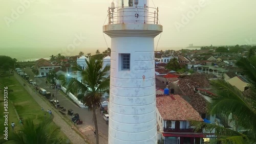 Aerial drone 4k. Galle Lighthouse. Old fortress, Ceylon famous summer tourism destination landmark. photo