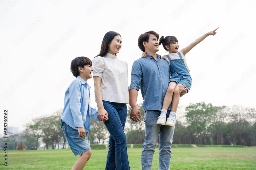 Asian family photo walking together in the park Asian family photo walking together in the park