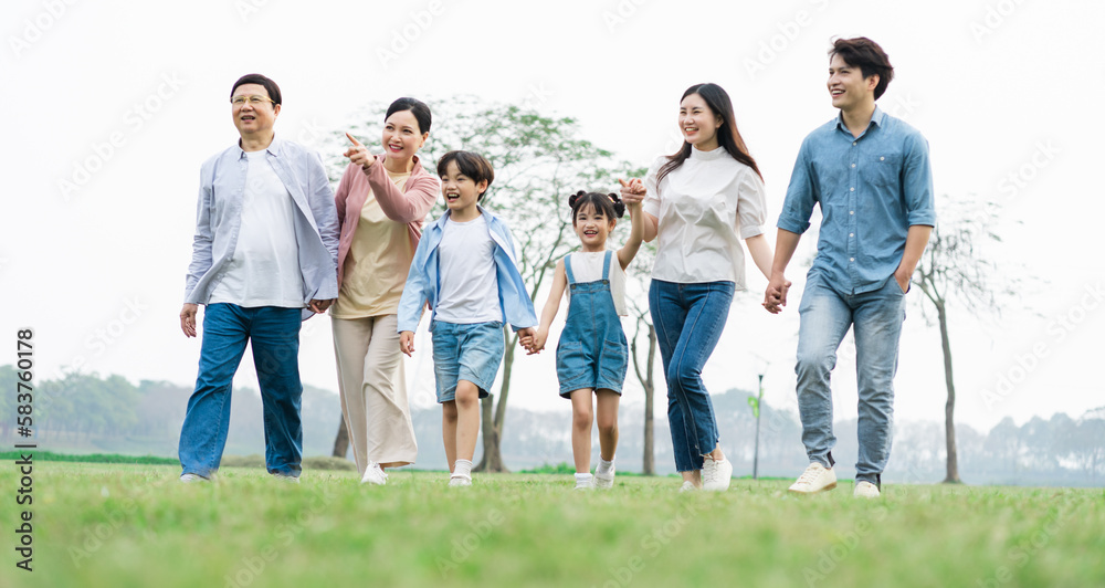Asian family photo walking together in the park Asian family photo walking together in the park