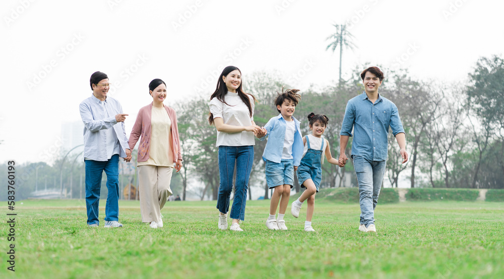 Asian family photo walking together in the park Asian family photo walking together in the park