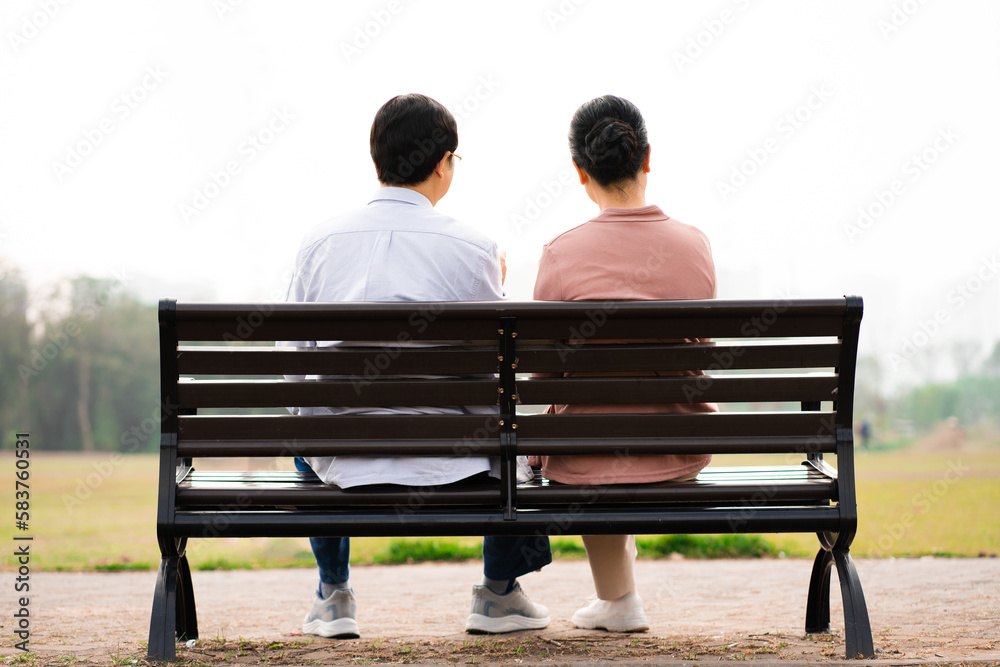 Elderly Asian couple in the park Elderly Asian couple in the park