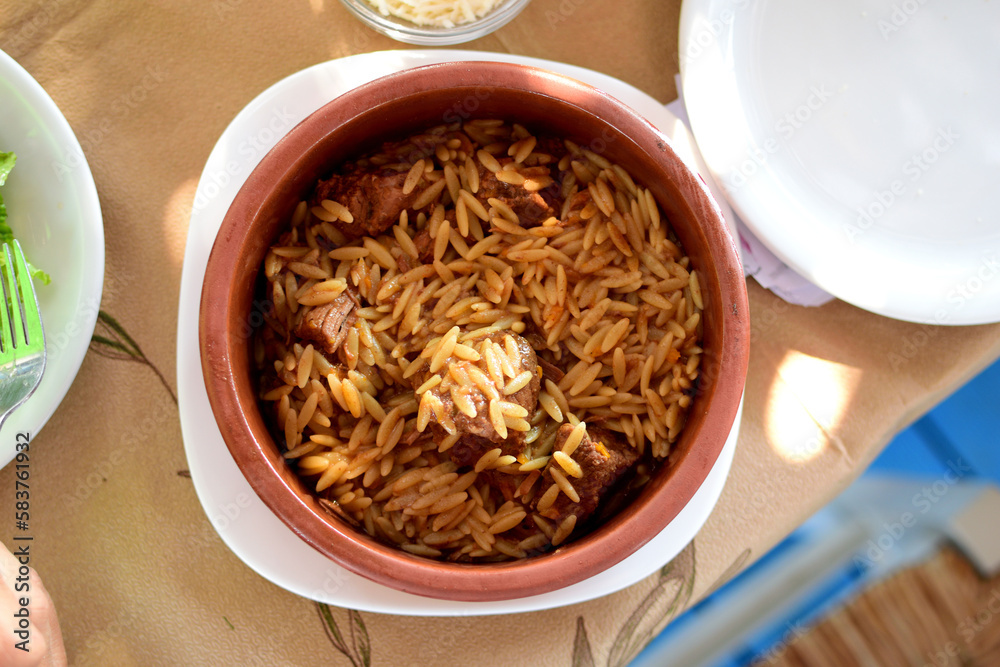 bowl of rice with meat