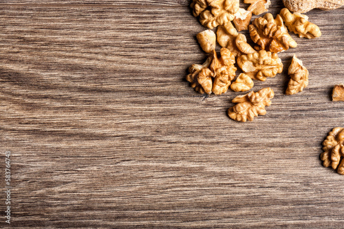 Nuts on wooden background in close up photo