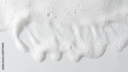 Abstract background white soapy foam texture. Shampoo foam with bubbles