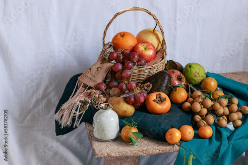 Fototapeta Naklejka Na Ścianę i Meble -  A table filled with twelve different round sweet fruits, a Filipino belief and ritual to bring luck in the New Year
