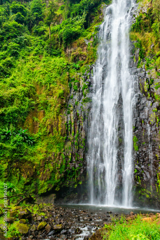 View of Materuni waterfall on the foot of the Kilimanjaro mountain in Tanzania View of Materuni waterfall on the foot of the Kilimanjaro mountain in Tanzania