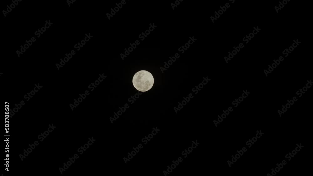 Wide shot of a full moon