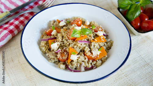 Delicious green salad with quinoa and vegetables.