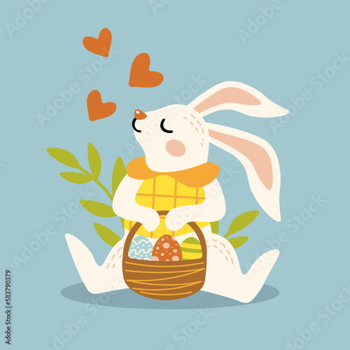 cute bunny sitting with a basket of easter eggs