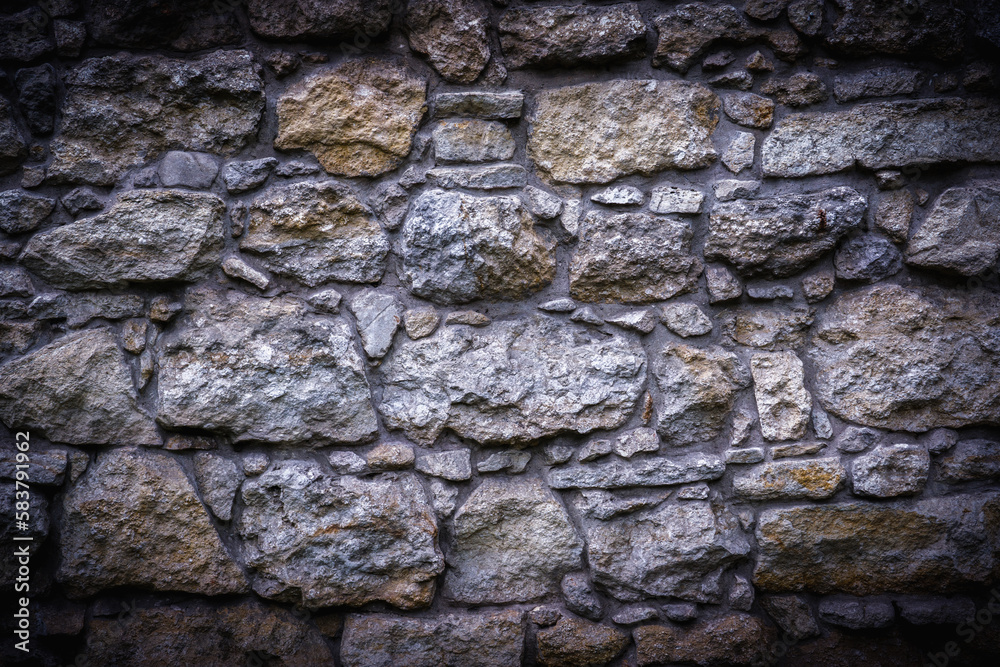 Fragment of an medieval ancient stone wall texture background. Fragment of an medieval ancient stone wall texture background.