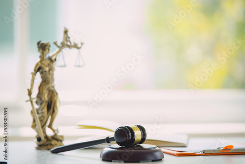 The statue of justice  IUSTITIA Justitia, the goddess of Roman justice in the lawyer office \
Law justice courtroom concept constitution judge court