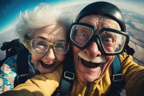 Selfie of a retired couple jumping in a parachute. generate by ai photo