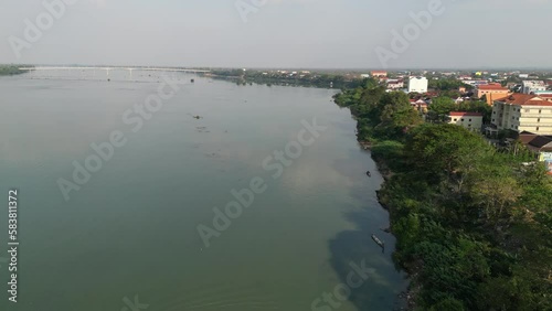 Aerial drone footage along river banks of Stung Treng and the Sekong, Cambodia. Camera drone is moving foward above the landscape 2-2 photo