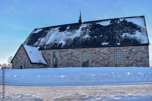 Rows with red huts in Gammelstad church town located near the Swedish town Lulea. photo