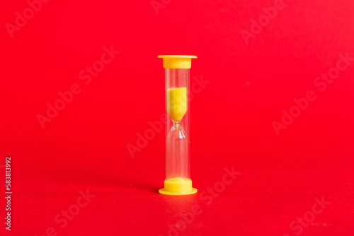 hourglass on the table, sand clock as time passing concept for business deadline, copy space