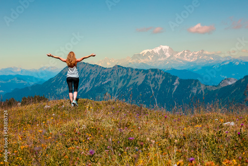 Woman traveler hike in Alps French mountain