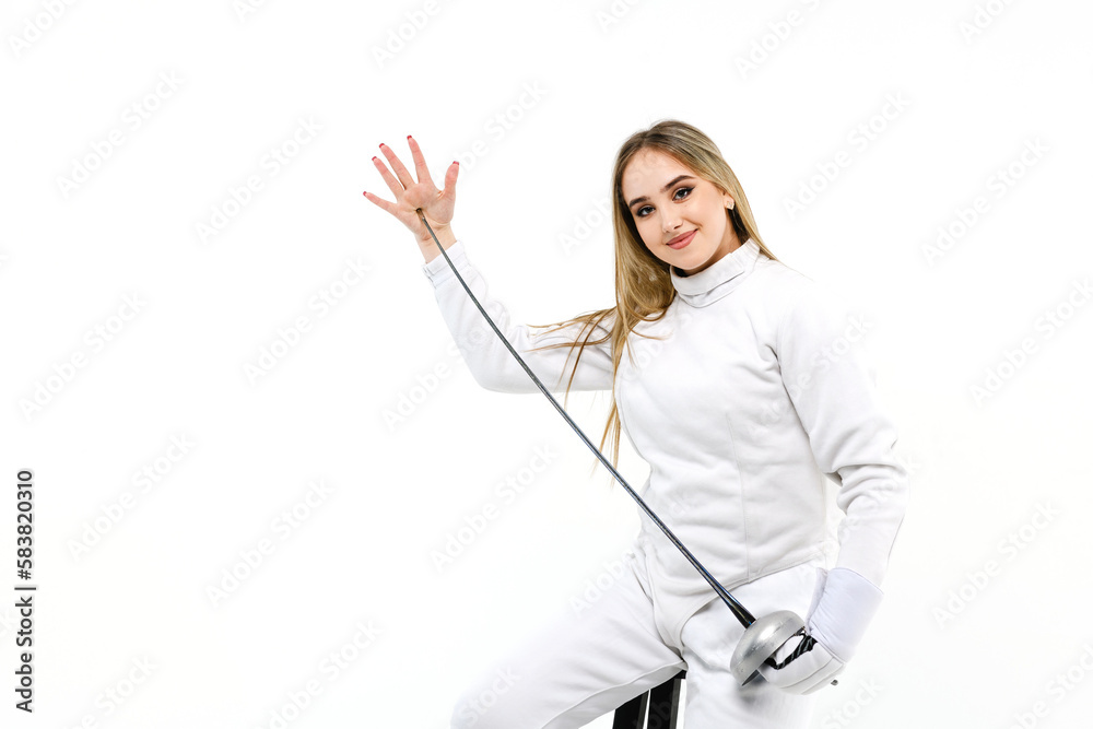 Teen girl in fencing costume with sword in hand on white background Teen girl in fencing costume with sword in hand on white background
