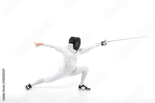 Female fencer practicing with a sword on a white background