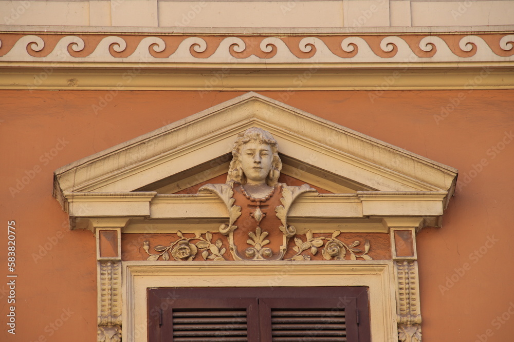 Obraz premium Prati District Pediment with Sculpted Decoration above a Window in Rome, Italy
