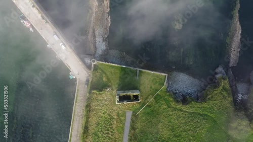 Drone looking down on Carrigaholt Castle and fishing Harbour Clair Ireland photo