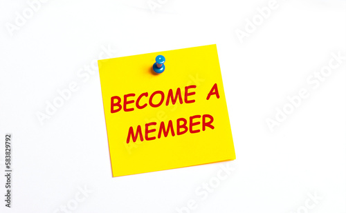 On a white background under the red button is a yellow sticker with the text BECOME A MEMBER