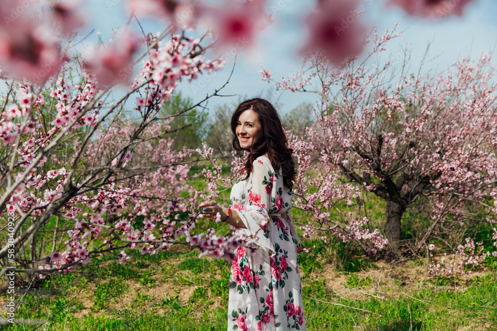 woman in peach garden rose trees nature parks walk woman in peach garden rose trees nature parks walk