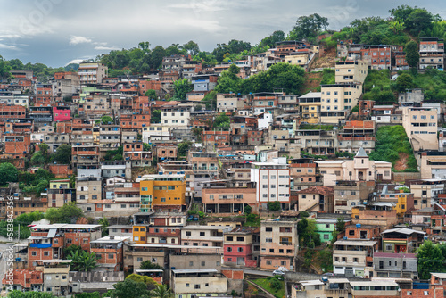 Colorful Favelas Covering Mountain Slope © F.C.G.