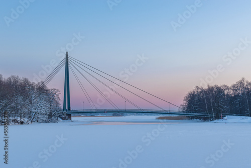bridge over a frozen river in winter, Helsinki, Finland