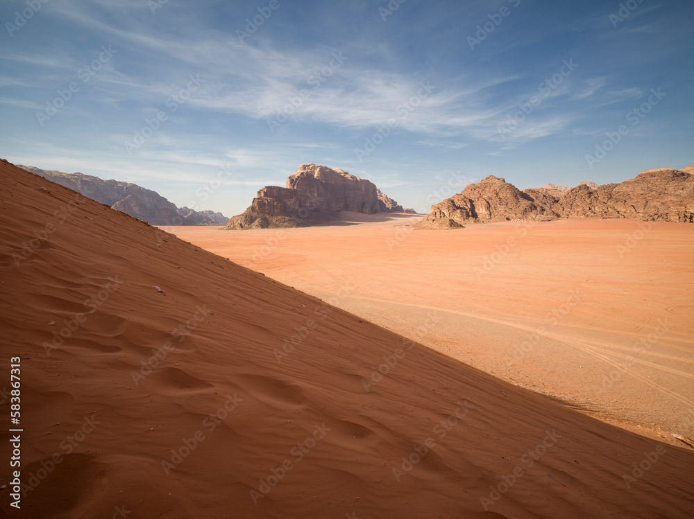 Wadi Rum desert plain from a sand dune, UNESCO World Heritage Site, Jordan Wadi Rum desert plain from a sand dune, UNESCO World Heritage Site, Jordan