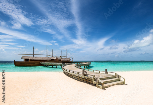 A jetty to a dhoni, a traditional Maldivian fishing boat, Baa Atoll, Maldives, Indian Ocean photo