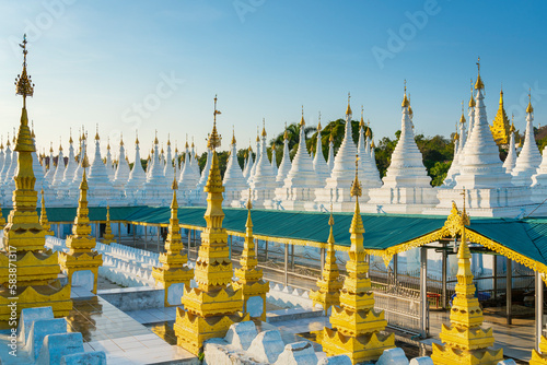 White pagodas at Sanda Muni pagoda, Mandalay photo