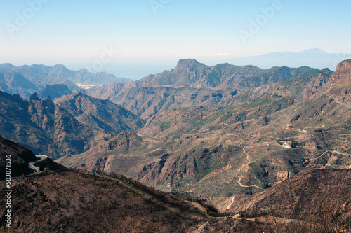 View on Gran Canaria mountains and twisty road from village Crus de Tejede, Spain
